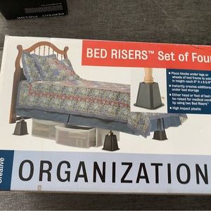 Set of bed risers new in box by Creative Organization color black